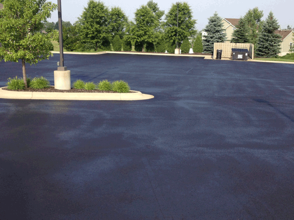 Street Sweeping Services in the Grand Rapids, Michigan area-Asphalt Sealcoated parking lot image